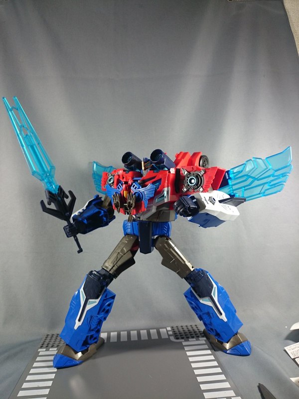 TAV 50 Hypersurge Optimus Prime Transformers Adventure Figure In Hand Photos 08 (8 of 13)